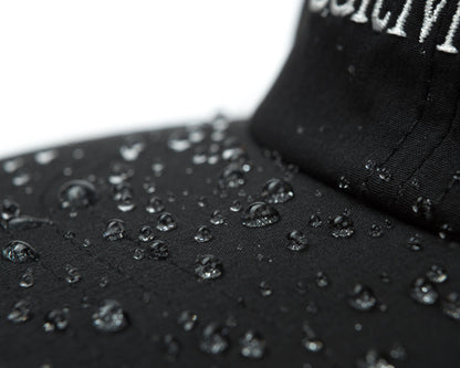 PeaceShell Running Cap - detalle del acabado repelente al agua