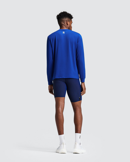 Polo manga larga Bandit Micromesh para hombre, color Bauhaus Blue - vista frontal de cuerpo entero