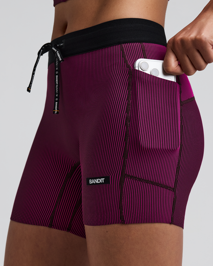 Women's Cadence Comp. Shorts Espresso / Azalea - vista lateral con bolsillo