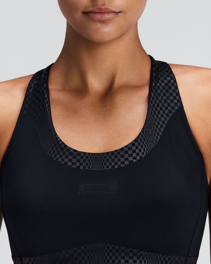 Top deportivo Bandit Stamina-V Threshold para mujer, color negro - detalle frontal